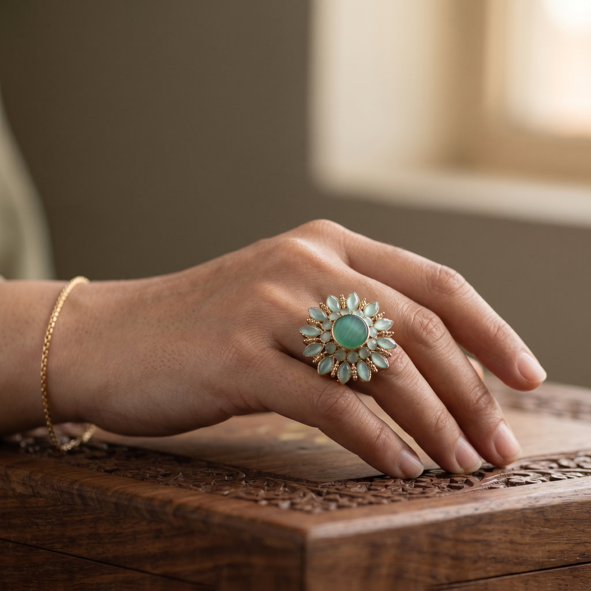 Neelofar blue gemstone desi ring with ornate gold detailing for Eid and everyday luxury wear - Ahmad K Collections